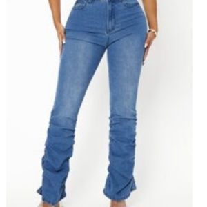 Flared jeans with ruffles on the side